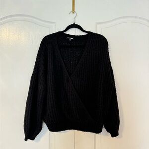 Black V-Neck Sweater with Long Sleeves and Soft Knit Texture